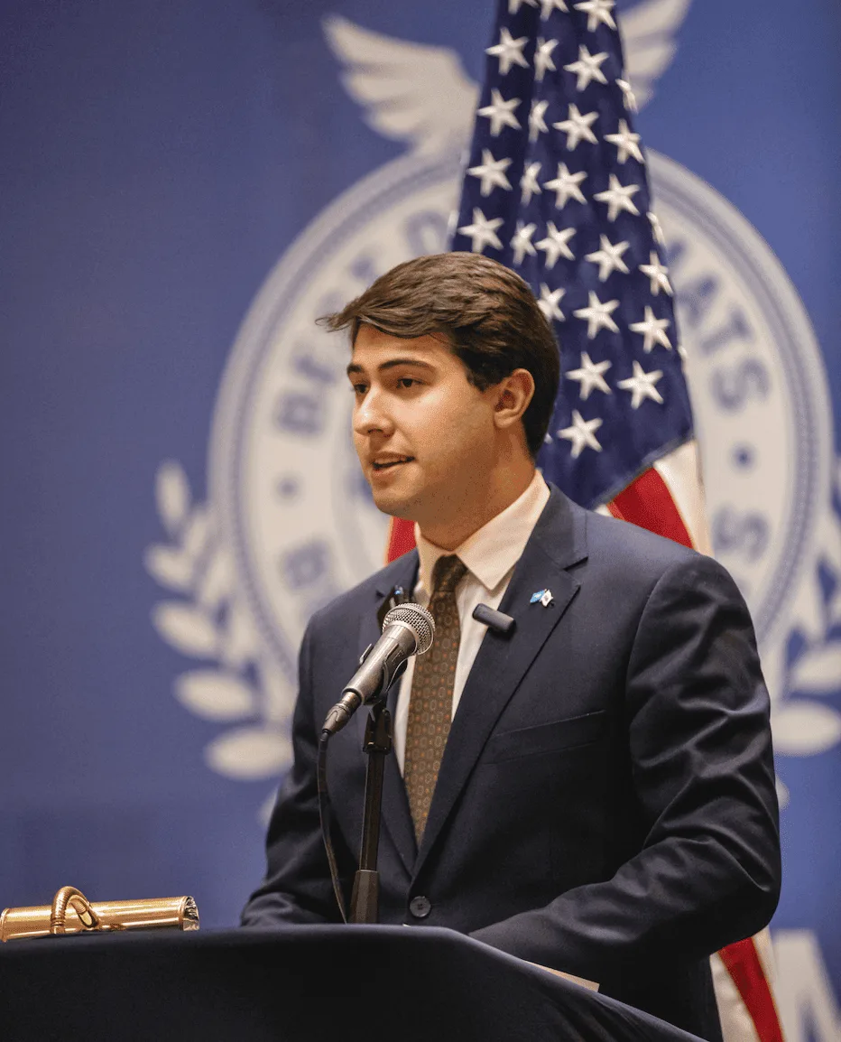 Delegate speaking at a Best Diplomats conference